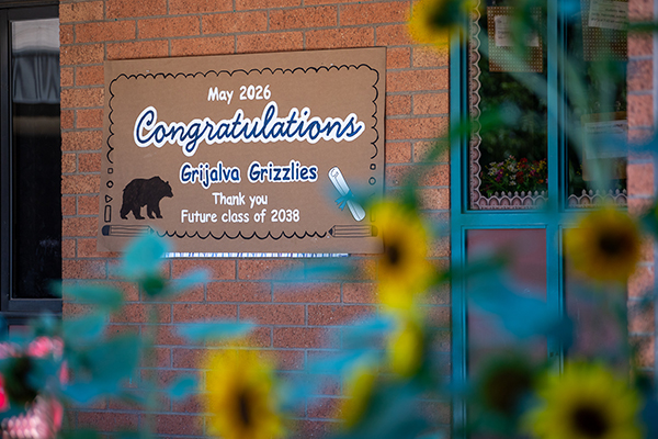 A sign outside the school reading May 2026 Congratulations Grijalva Grizzlies Thank you Future class of 2038